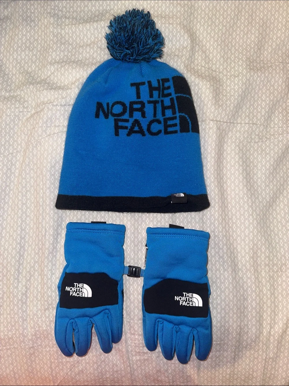 The North Face Blue Pom Beanie and Matching Gloves Set